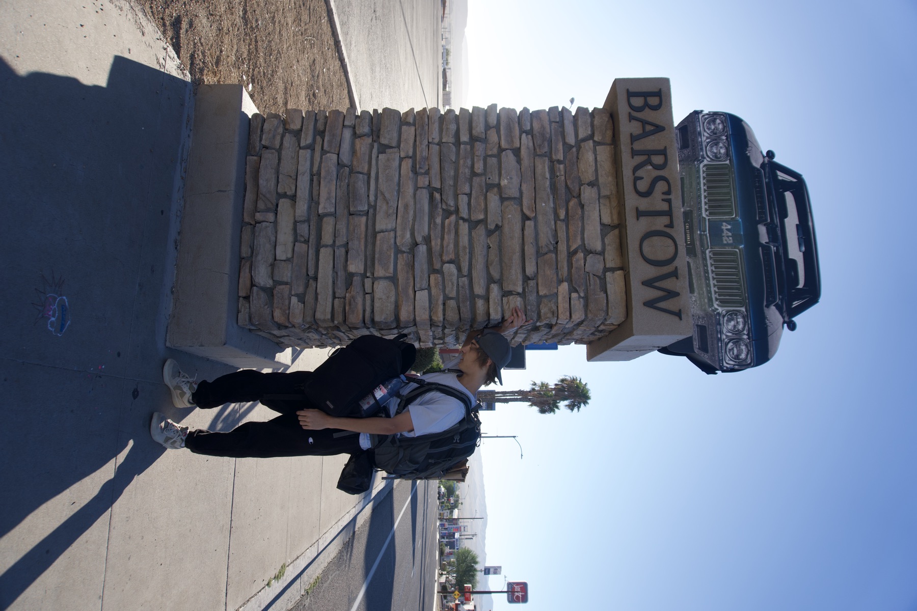Welcome to Barstow! Taking a breather against the town sign
